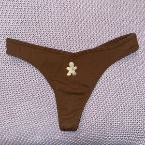 Ginger bread man embroidered holiday thong panty by PINK Victoria’s Secret